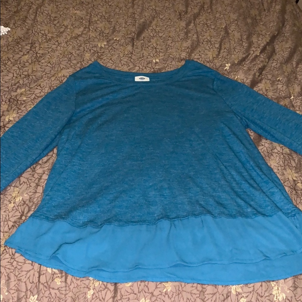 blue top with a shear trimming